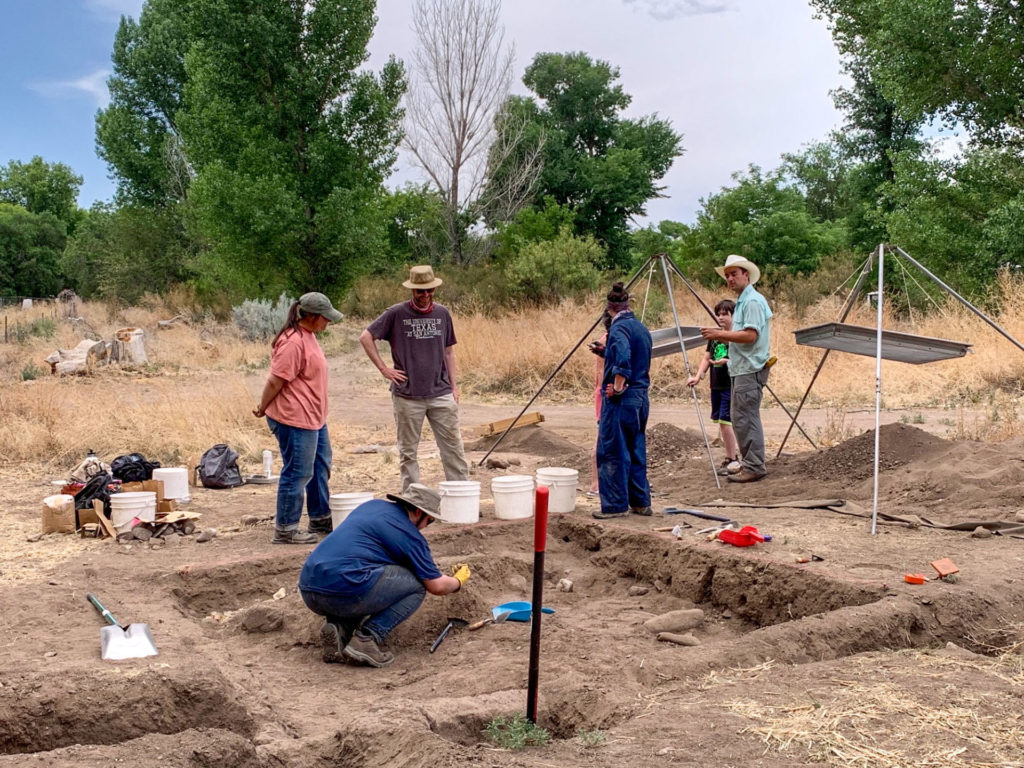 A grandson and grandmother join young students in the field, excited to learn about archaeological sites close to their home. Image: Megan Eigen