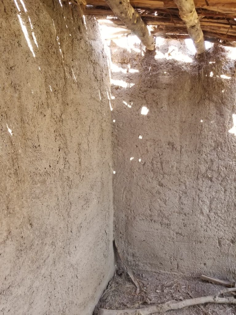 The interior wall surfaces of the Mule Creek structure are in much better shape than the exterior surfaces, even though the adobe on the roof has been washed away by rains.