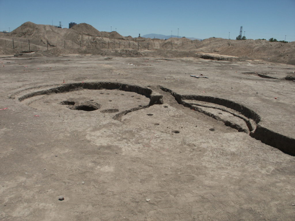 This image shows two pithouses from the Clearwater site. The soil layer that these houses were constructed upon dates these homes to around 400 B.C.