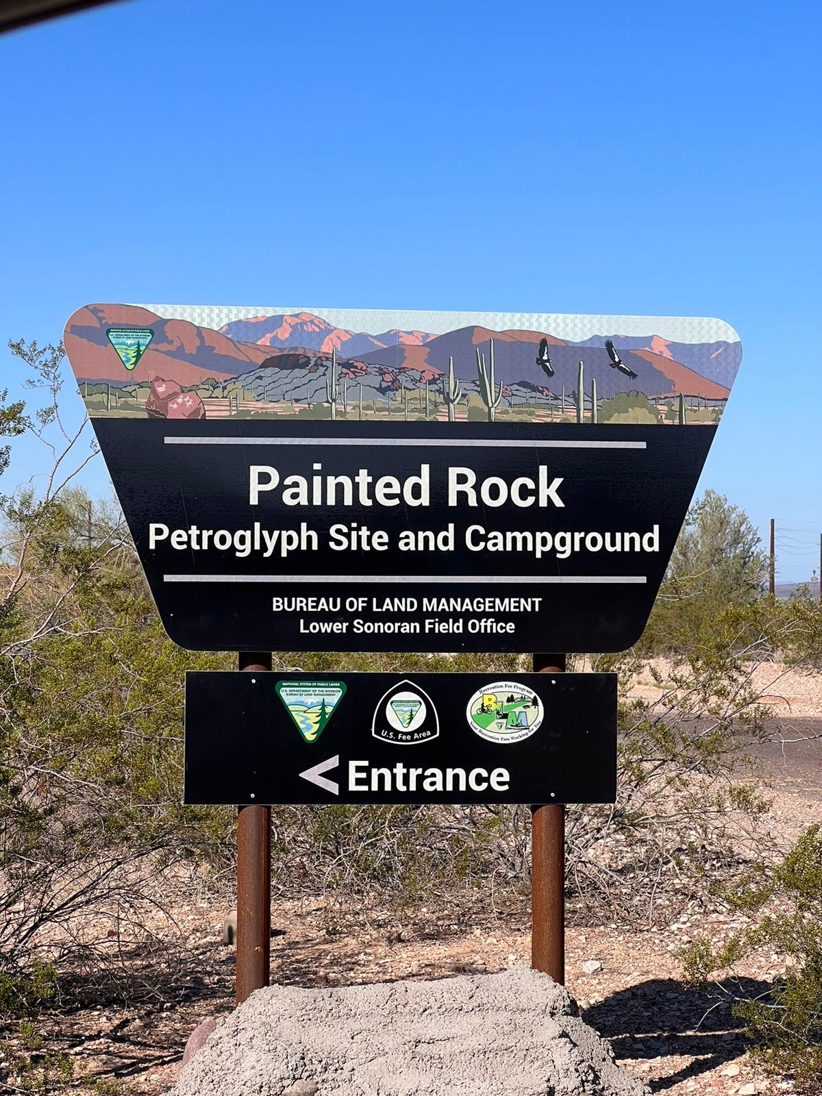 This image shows the official sign for the Painted Rock Petroglyph Site and Campground.