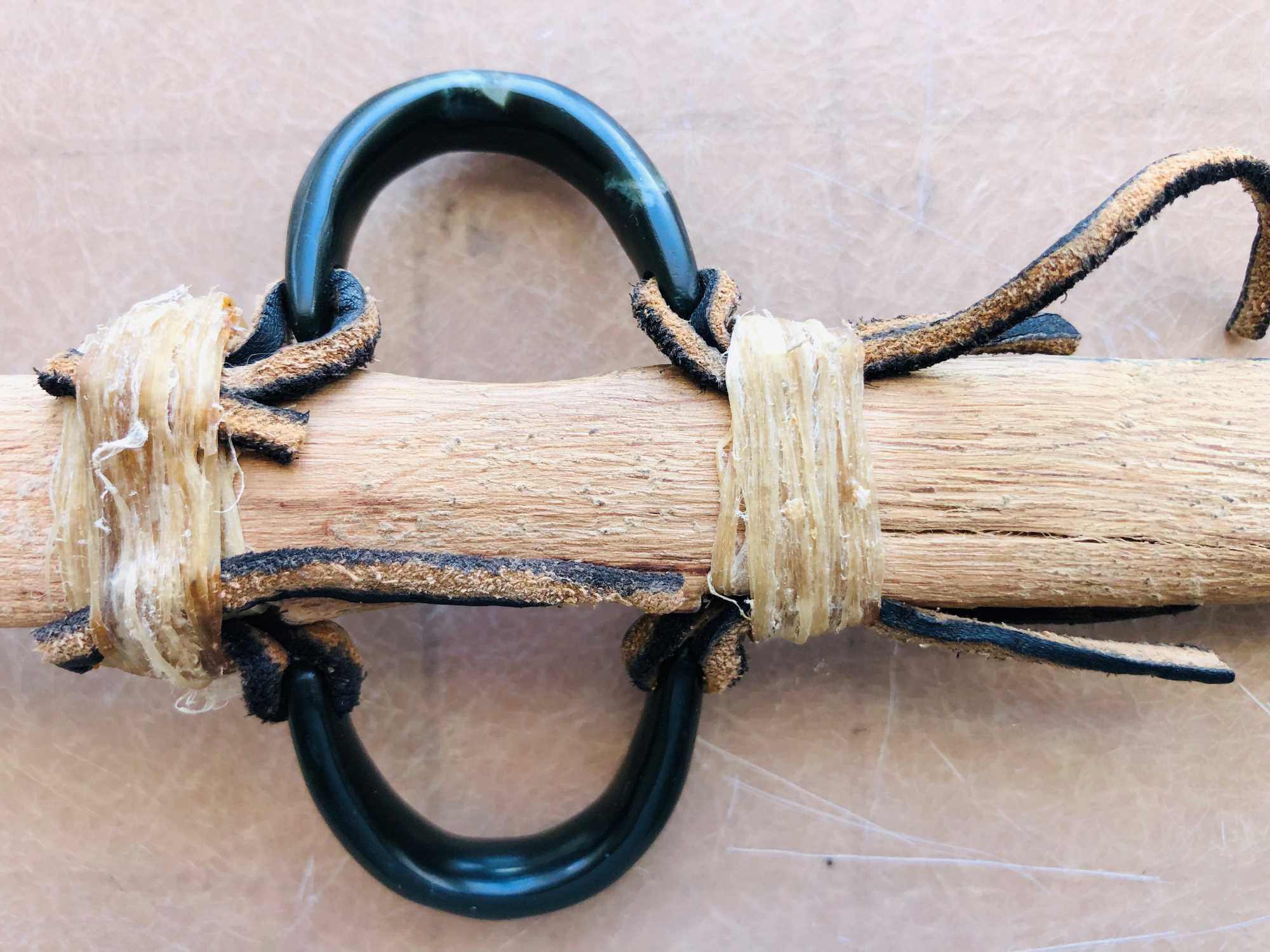 An atlatl loop I made of Wyoming jade using modern tools.