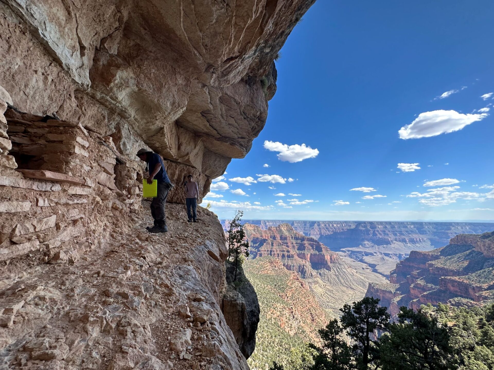 Ritchie Sahneyah doing a site condition assessment of ancient granaries, Grand Canyon National Park.