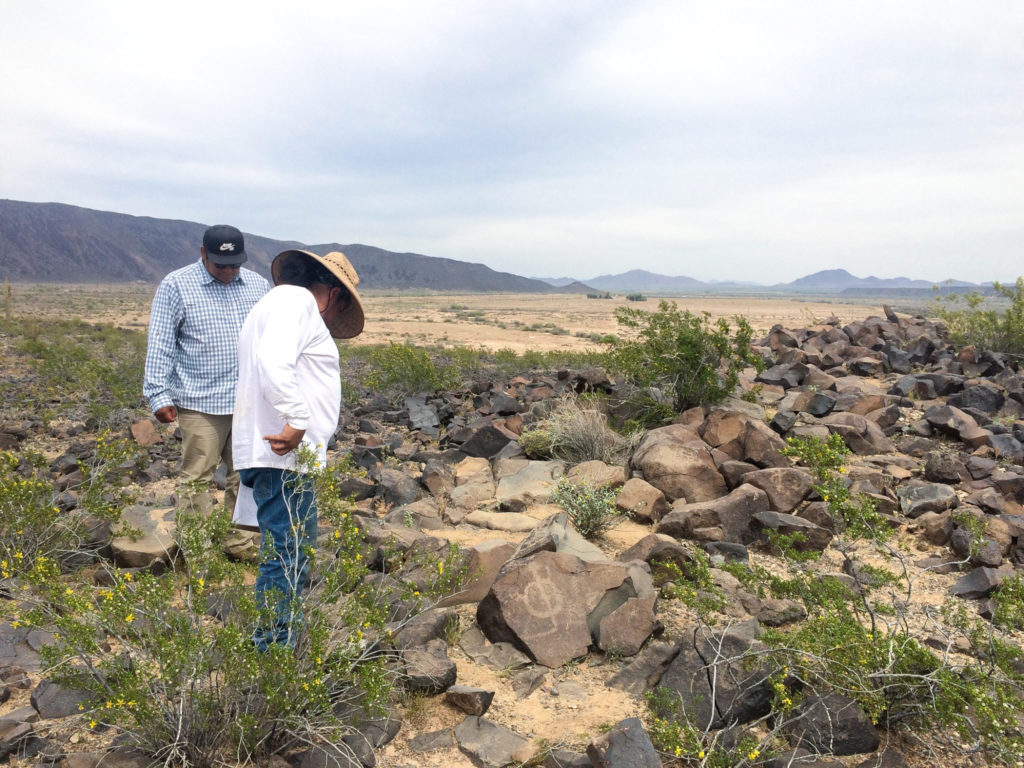 Skylar and Charles Arrow, of the Fort Yuma Quechan Indian Tribe, documenting petroglyphs.