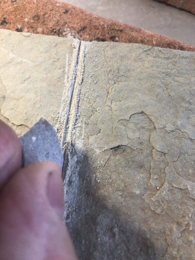 I incised a line a few millimeters deep on either side of my slab to ensure that it would snap cleanly.