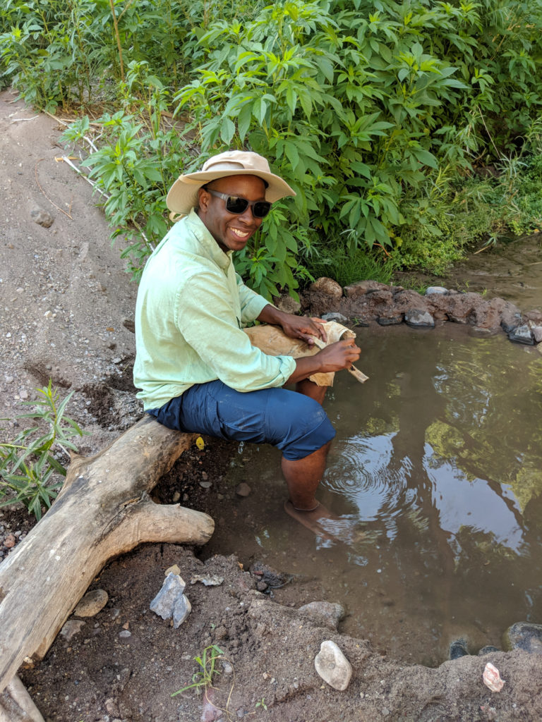 Alexis carving an atlatl