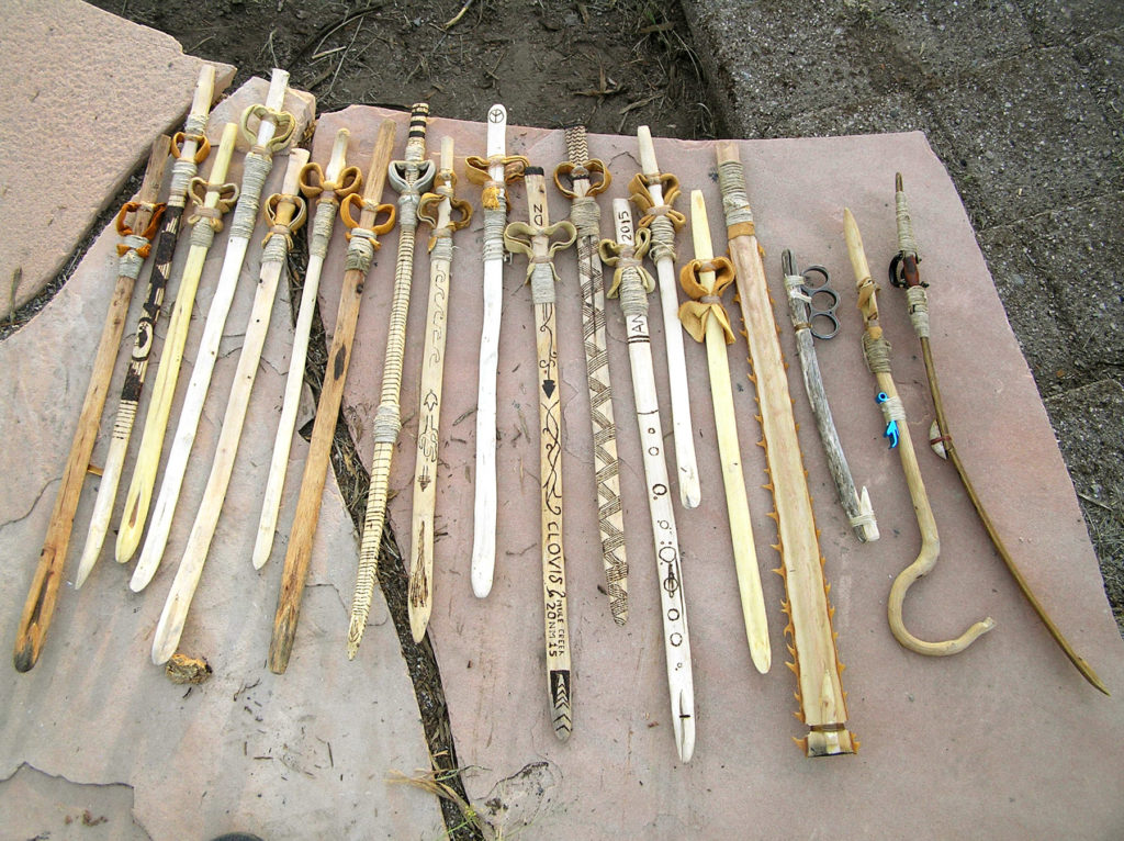 Replica atlatls like the ones you will be learning to make in this class.