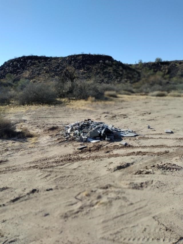 Remains of a bathroom remodel dumped at the site. Image: Beach Pitzer
