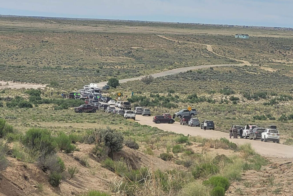 Vehicles and protestors do not allow travel on the road into Chaco Culture National Historical Park.