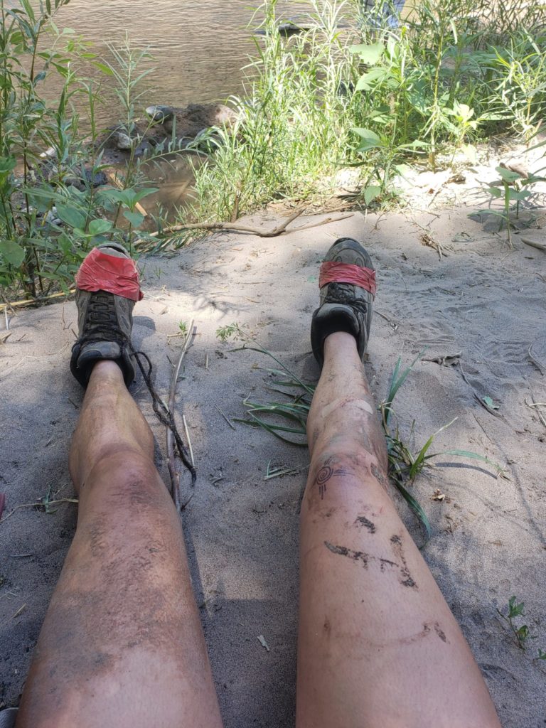 After an exfoliating day mudding the adobe, we rest and relax by the river. Also, remember: proper footwear is a must! Image: Emilee Simpson