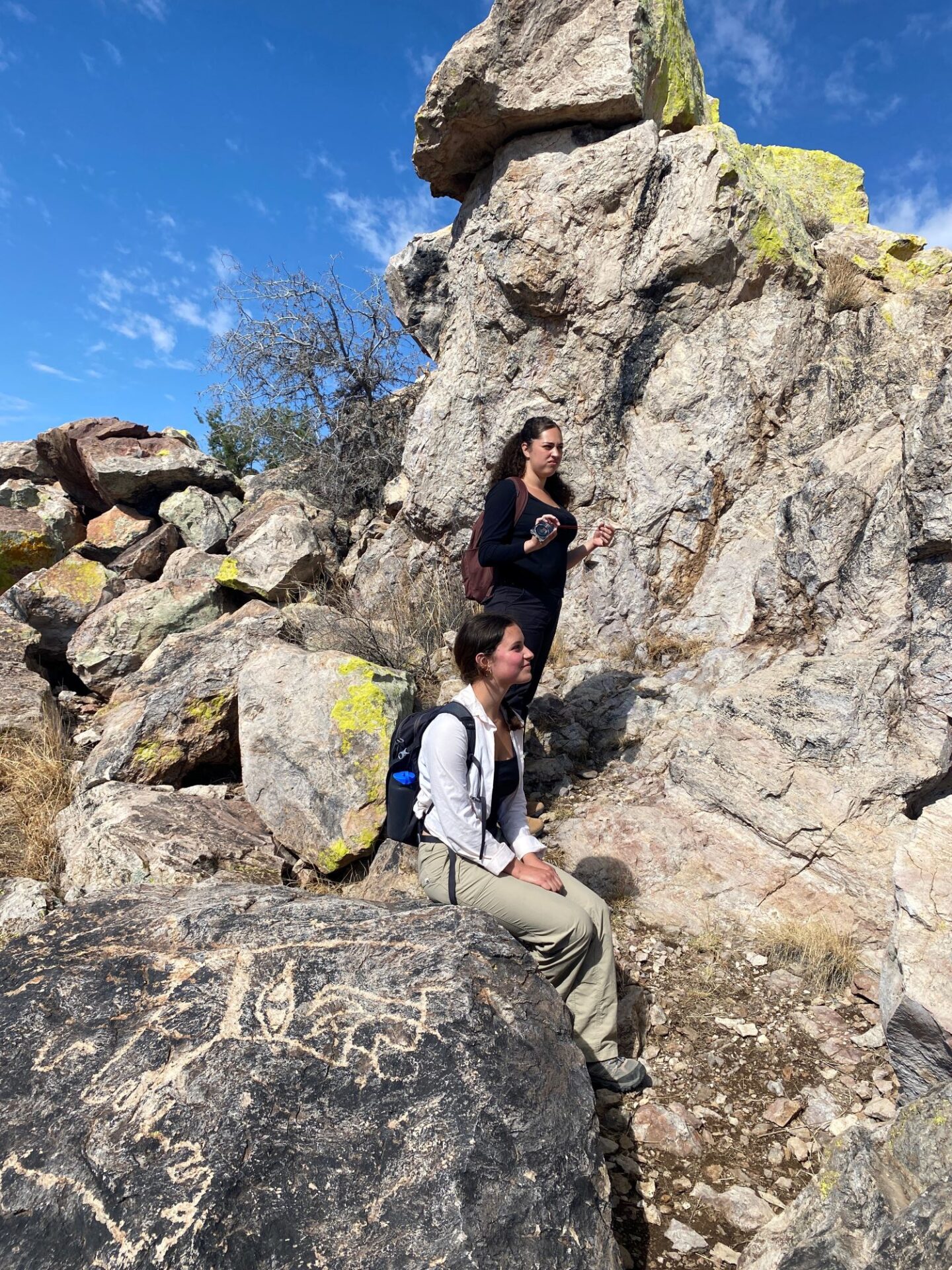 Carmen and Jayden at a rock imagery site in the Mimbres Valley.